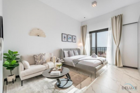 Stunning Studio Apartment in MAG EYE 890,MBR City by Deluxe Holiday Homes